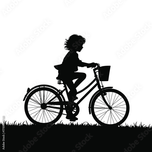 Silhouette of a Girl Riding a Bicycle on a Grassy Field