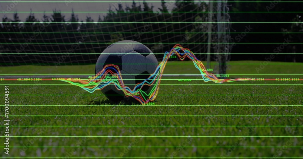 Fototapeta premium Displaying soccer ball on grass sports field with grid overlay, waveform and numeric annotations