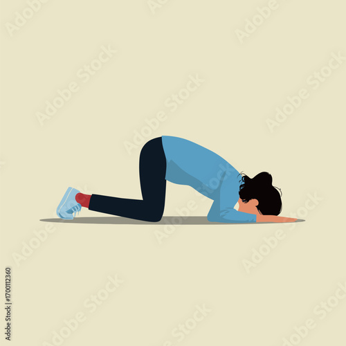 A person performing a yoga pose on the floor, positioned on all fours with their forehead resting on the ground. The setting appears relaxed and minimalistic, promoting calmness.