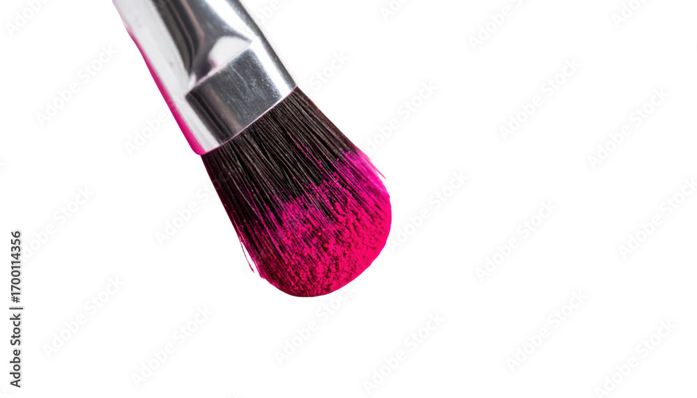 Fototapeta premium A close-up of a makeup brush featuring vibrant pink bristles.