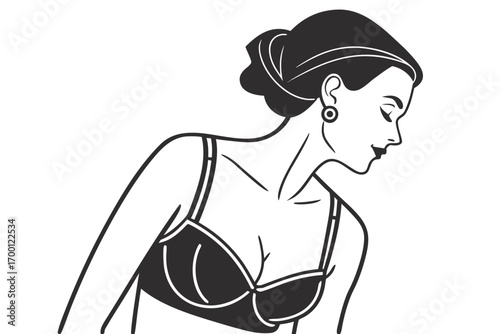 Elegant woman in a bra with hair updo and earring