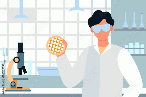 Engineer holding wafer chip in laboratory
