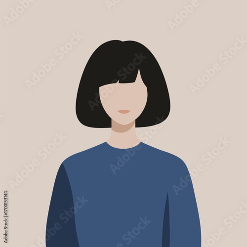 A young woman stands against a neutral background, wearing a blue sweater. Her dark hair is styled in a bob cut, creating a minimalistic yet striking image.