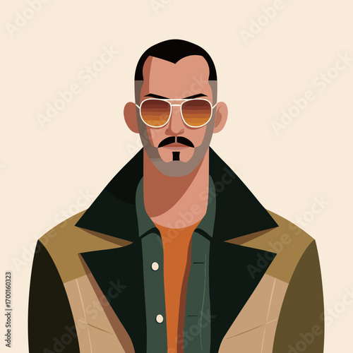 A fashionable man with a well-groomed beard and stylish sunglasses stands confidently. He wears a modern jacket that complements his bold look, set against a plain backdrop.