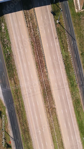 Wallpaper Mural Busy Two 2 Lane Highway Drone Cars and Trucks Driving in Texas Vertical Torontodigital.ca