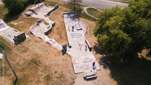 Wallpaper Mural Skateboard Park Drone with Children Skateboarding Biking and Riding Scooters on Warm Summer Day  Torontodigital.ca