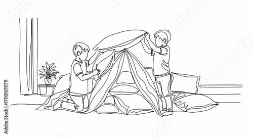 Two boys build a pillow fort in their bedroom.