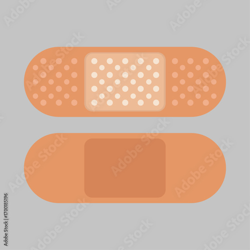 Two Adhesive Bandages Close-up Shot of Band-aids Against a Gray Background
