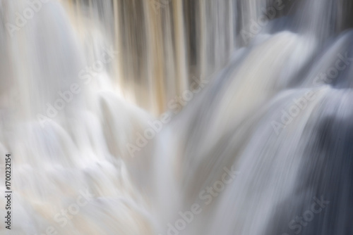 Kakabeka Falls, Ontario's stunning natural wonder, cascades powerfully through lush forests, offering mesmerizing scenic views and a serene escape into nature's beauty.
