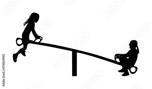 Children play on seesaw silho...