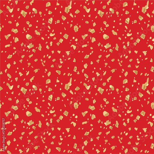 Red background with scattered gold flecks creating a festive texture pattern, patern seamless, Stock royalty image.