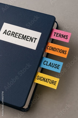 healthcare agreement staff concept. Notebook with tabs labeled for contract details and agreement.