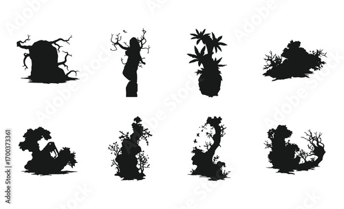 Collection of mysterious grungy spooky tree silhouettes and abstract organic shapes for design