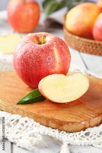 Fresh Red Apples with Water Droplets on Wooden Cutting Board - Healthy Fruit Photography