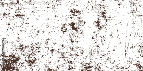 Textured vintage brown wall with a grunge pattern of rusty, peeling paint and dust