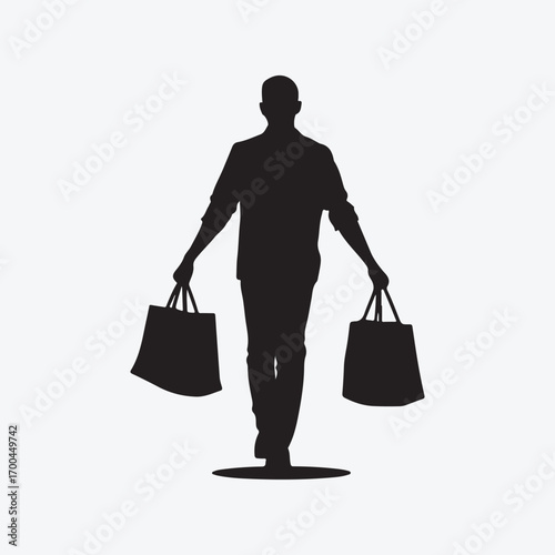 Black silhouette of a man walking with shopping bags carrying
