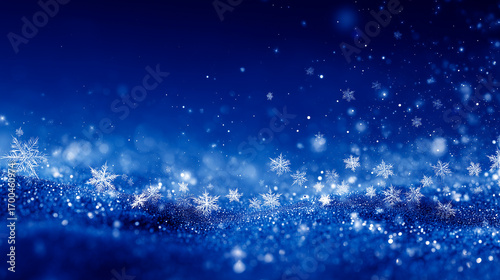 ラメのように輝く雪原と結晶・高級感あるブルー冬背景