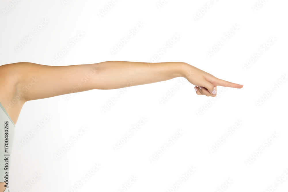 Fototapeta premium Extended female arm pointing right – anatomy, gesture, communication, direction, hand movement, human body, isolated on white background, stock image.