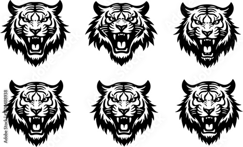 "Set of Roaring Tiger Head Silhouettes in Tribal Style"