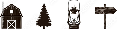 Four vintage lanterns and a desk lamp illuminated in darkness showcasing retro lighting silhouette