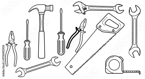 Collection of hand tools, including hammer, screwdriver, wrench, pliers and saw