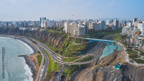 Obraz na plátně Aerial view of bridge la paz, highway traffic, and miraflores cityscape in lima,