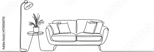 Minimalist living room scene with sofa and plant couch pillows
