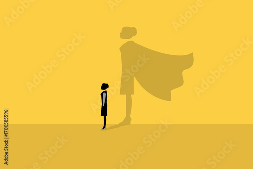 Business woman turned into or shadow a superhero. Concept of success, Leadership and teamwork