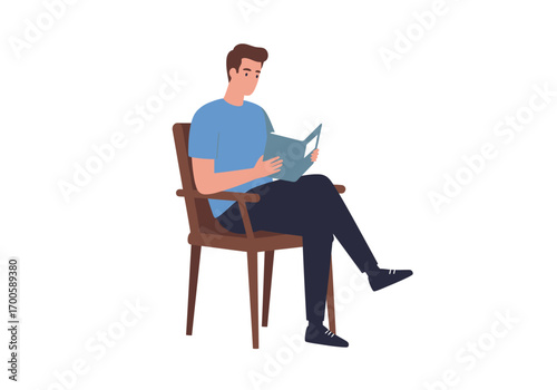 A man is sitting in a chair reading a book