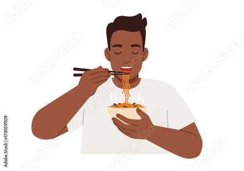 Person eating noodles with chopsticks from a bowl