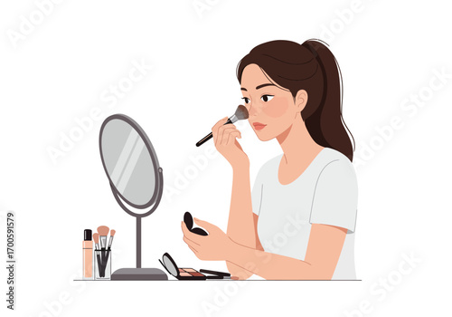 Woman applying makeup while looking in mirror Cosmetics brushes visible on table