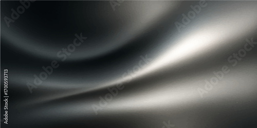 Abstract metallic background featuring a brushed stainless steel texture with a shiny gray surface and subtle light patterns