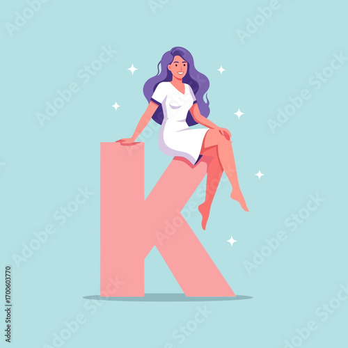 Charming Woman in a White Dress Sitting on a Large Pink Letter K with Sparkles