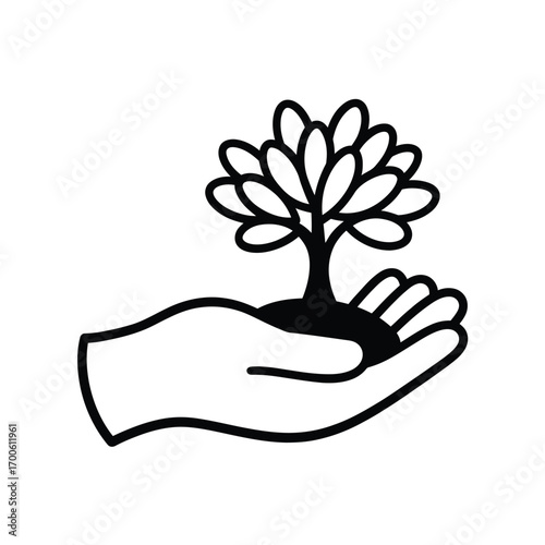 Hand holding a small tree seedling symbolizing growth and nature