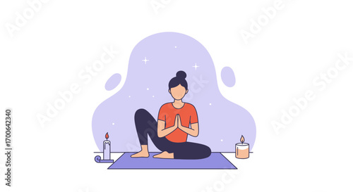 Woman meditating with candles
