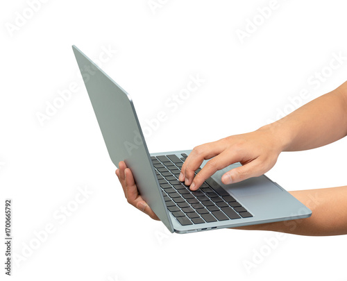 Side view of hands using modern laptop with customizable blank screen. Isolated on transparent PNG. Concept for technology, business, finance and advertising.