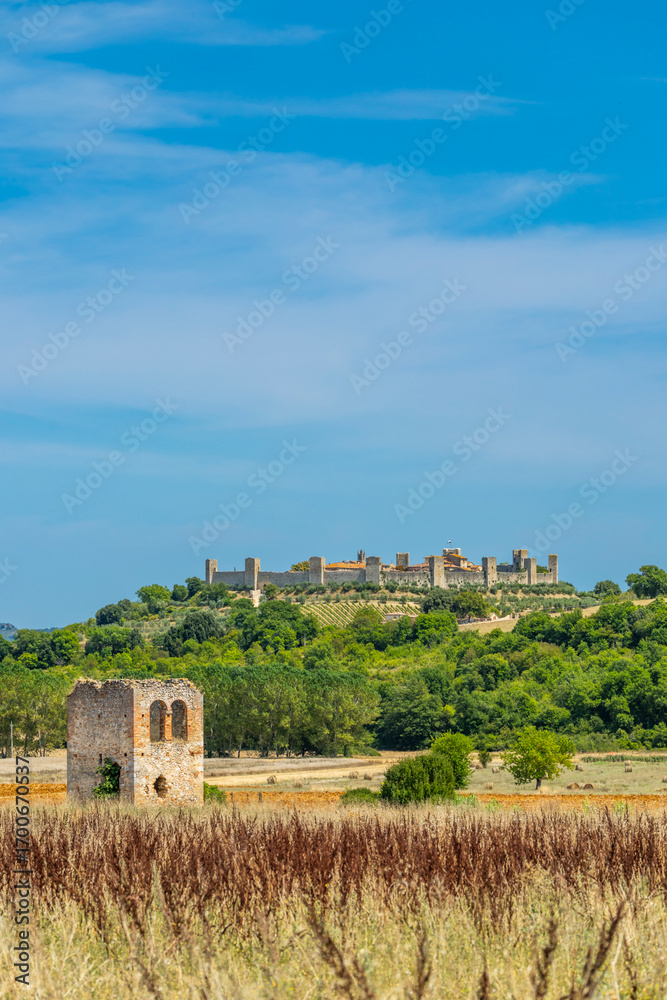 Obraz premium Monteriggioni dominating the Tuscan countryside from its hilltop position