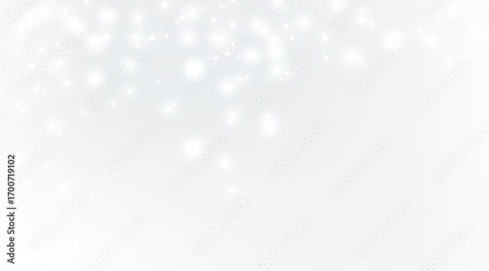 Fototapeta premium Sparkling glittering particles falling downward against a softly lit gradient background isolated on white background