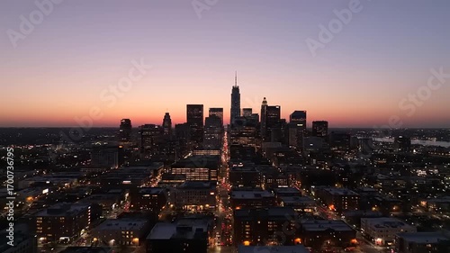 Stunning aerial view of a vibrant city skyline at dusk