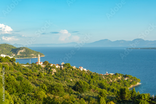 Fototapeta Naklejka Na Ścianę i Meble -  Catholic church in Igrane village on Makarska riviera, Makarska riviera, Dalmatia region of Croatia