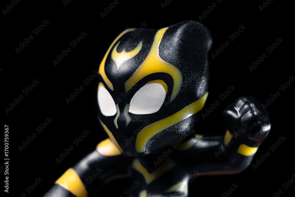 Naklejka premium Kinder Surprise Marvel Black Panther throws a punch closeup