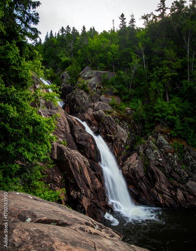 Waterfall cascading down rocky terrain (1)