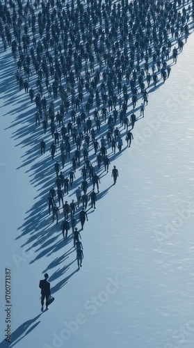 A single businessman leads a large crowd of people
