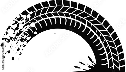 A graphic illustration of a curved black tire track with grunge-style mud and dirt splatter effects.