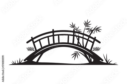 Silhouette of a curved wooden bridge with bamboo
