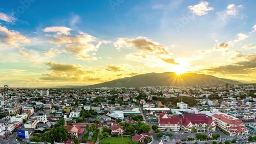 Aerial view of Chiang Mai city at sunset with Doi Suthep mountain backdrop
