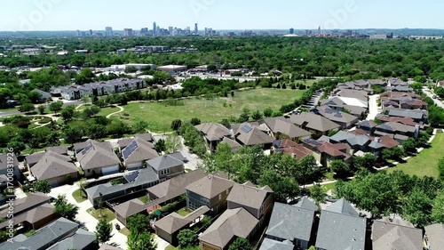 Austin texas aerial view of residential neighborhood with downtown skyline in distance
