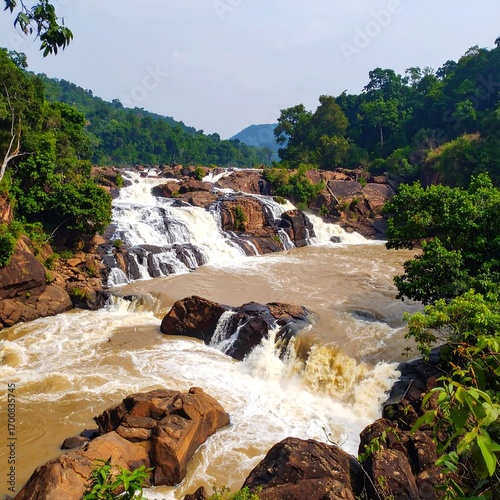 Waterfall cascading through rocky terrain