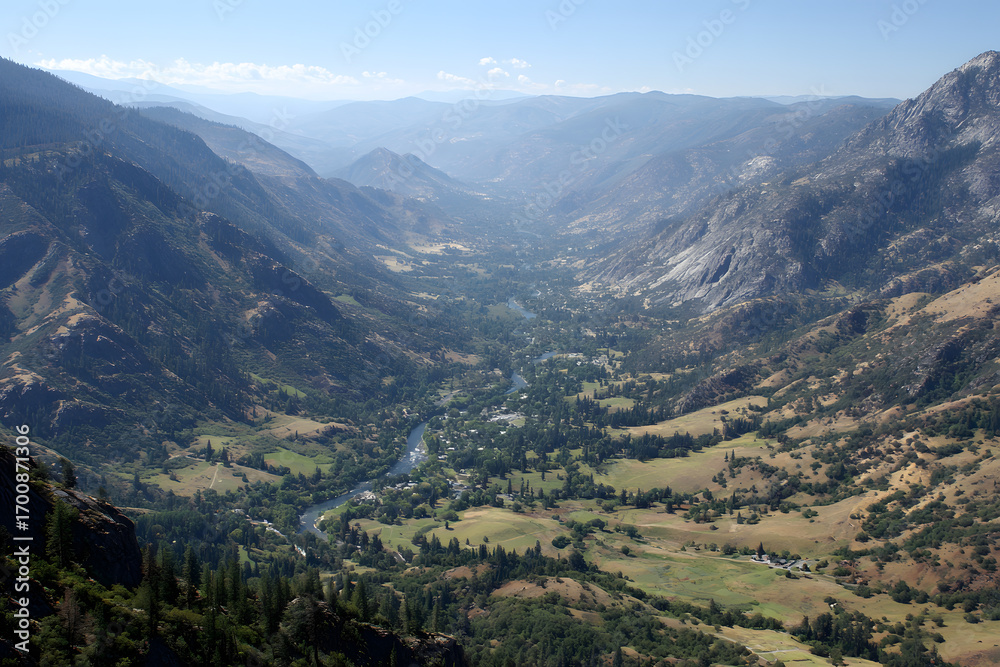 Fototapeta premium Mountain valley landscape view with river forest and town from high viewpoint