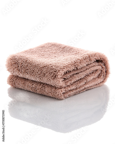 Folded, light-pink microfiber towel